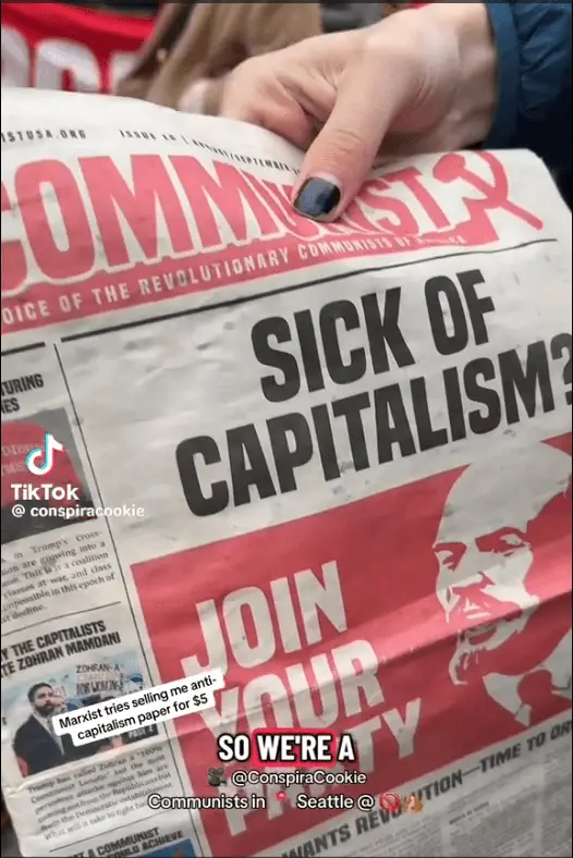 Communist newspaper headline reading “Sick of Capitalism?” being sold for five dollars, showing irony of capitalism supporting communism.