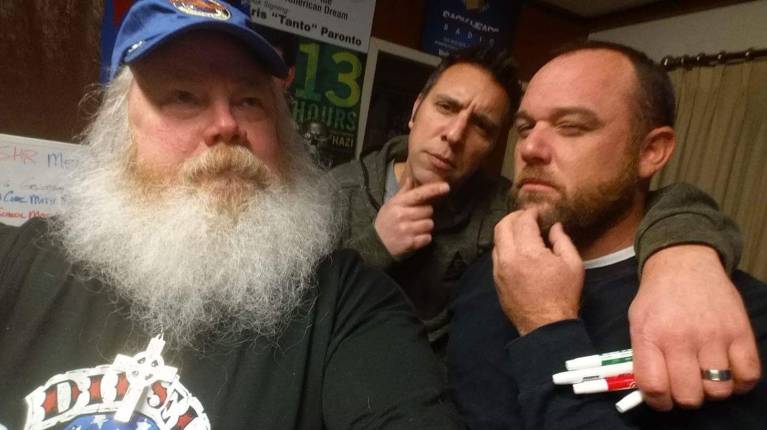BZ, Sack Head Clint, and Sack Head Shaun of the Sack Heads Radio Show posing humorously in the old SHR Media studio.