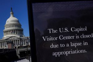 A sign outside the U.S. Capitol Visitor Center reads “Closed due to a lapse in appropriations,” symbolizing the ongoing government shutdown.