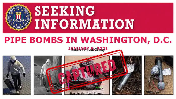 Updated FBI seeking information poster displayed with a red CAPTURED stamp following the filing of federal charges in the January 5 2021 Washington DC pipe bomb case.