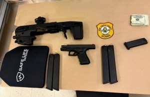 Firearms and ballistic equipment seized by New Castle County Police during Wilmington machinegun investigation