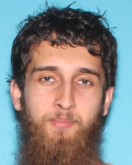 Luqmaan Khan booking photo released by New Castle County Police after November 2025 arrest