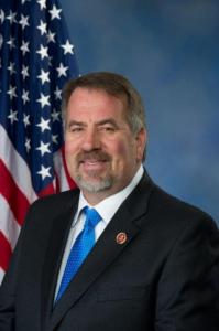 Portrait of Rep. Doug LaMalfa in front of the US flag